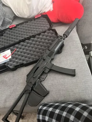 Saiga 9 EXP aka the backpack AK. The Zenitco muzzle is an antithesis to  subtle though, that thing noisy. : r/ak47