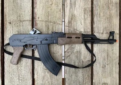 A black and white vector illustration of an AK 47 rifle. 2641446 Vector Art  at Vecteezy