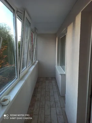 Фото балкона с отделкой штукатуркой