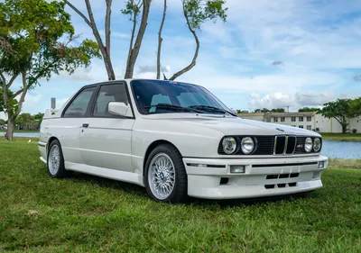 Modified bmw e30 in satin dark blue on Craiyon
