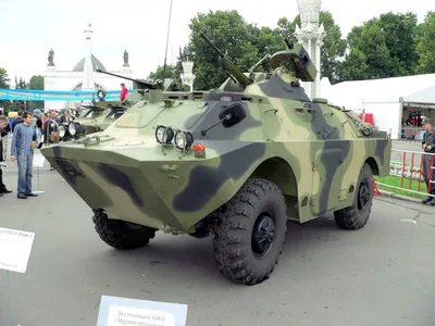 A right front view of a Soviet BRDM-2 amphibious scout car with launching  system for Sagger AT-3 anti-tank guided weapons (ATGW). The launching  system is contained within the vehicle and is raised