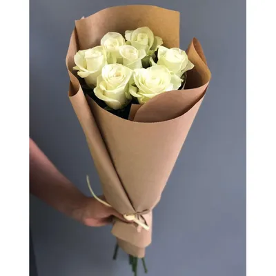 Букет из 7 розовых роз c зеленью в крафте купить с доставкой по Краснодару