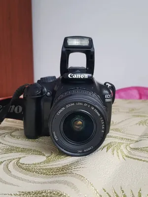 Зеркальный фотоаппарат Canon EOS 1100D Kit 18-55 IS II (состояние 4-) (б/у)  купить за 0 руб.