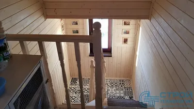 Отделка дома из оцилиндрованного бревна