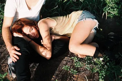 Boyfriend Lying On Knees Of Attractive Girlfriend Free Stock Photo and  Image 310994440