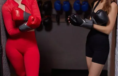 Девушка в боксёрских перчатках Stock Photo | Adobe Stock