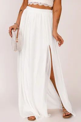 Белая длинная юбка с высокой талией и разрезом арт. 1827753 |  интернет-магазин VitoRicci