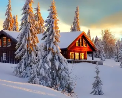 Дом в снегу фотографии