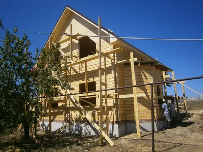 Проект дома из бруса 6 на 6 с ломаной крышей — фото и цена