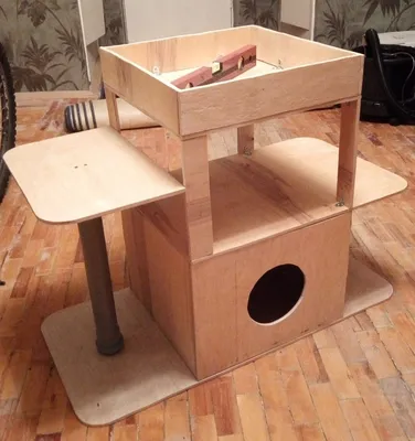 Креативный домик для кошки из коробки - фото