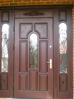 Входные металлические двери с ковкой - купить в Москве в компании «СталИван»