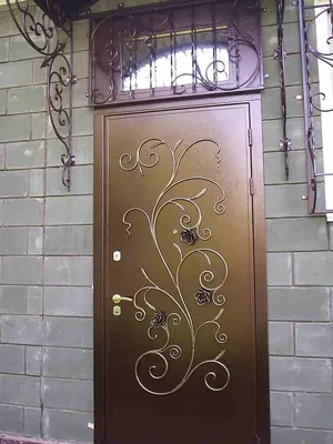 Арочная стальная дверь с элементами ковки и стекла ДА 17, цена 138 000 руб.  - Купить в Москве