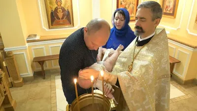 Видеосъемка крестин — Киев. Видеооператор на крещение