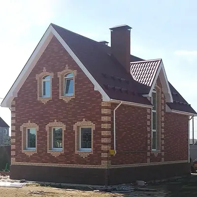 Проект двухэтажного дома из газобетона в европейском стиле с мансардой