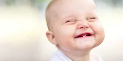 Признаки прорезывания зубов у малышей