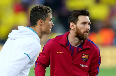 Ronaldo and messi in intense football match on Craiyon