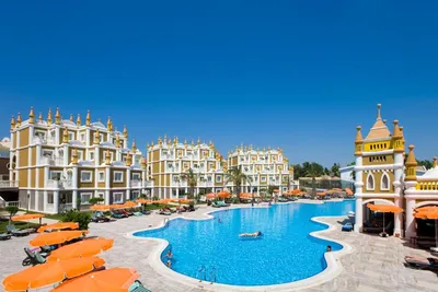 View of the Territory and the Bridge through the Pool in Kamelya World  Hotel. Editorial Stock Image - Image of luxury, bushes: 90171909