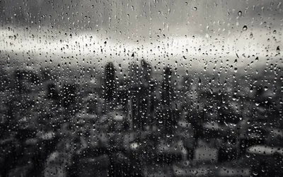 Фото Капли дождя на стекле - Природные скульптуры в крупном плане