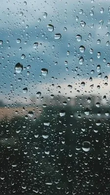 Фото Капли дождя на стекле - Уникальная атмосфера в каждой картинке 