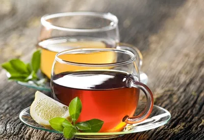 Чашка зелёного чая на столе съё…» — создано в Шедевруме