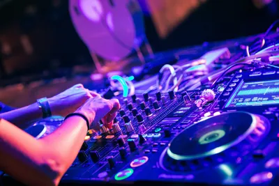 Person Using DJ Mixer · Free Stock Photo