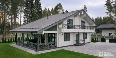 Природа и комфорт: стильный гостевой дом с террасой и панорамными окнами