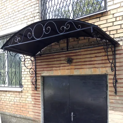 Кованые козырьки над входом в подвал КВП-04 на заказ от производителя в  Москве