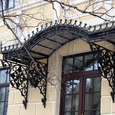 Кованый козырёк над балконом арт. 00403 - Художественная ковка металла -  кованые изделия заказать