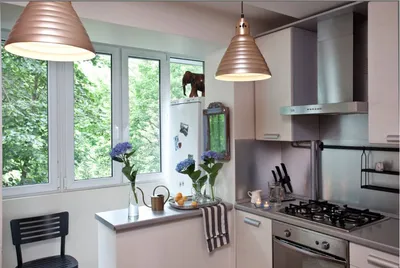 Дизайн кухонь совмещенных с балконом - 77 фото