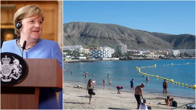 German Chancellor Angela Merkel chats with Russian President Vladimir Putin  (L) and US President George W. Bush (R) as they pose in a giant beach chair  for a family picture with G8