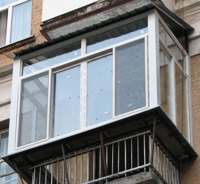 Отделка балкона снаружи (металлосайдинг)