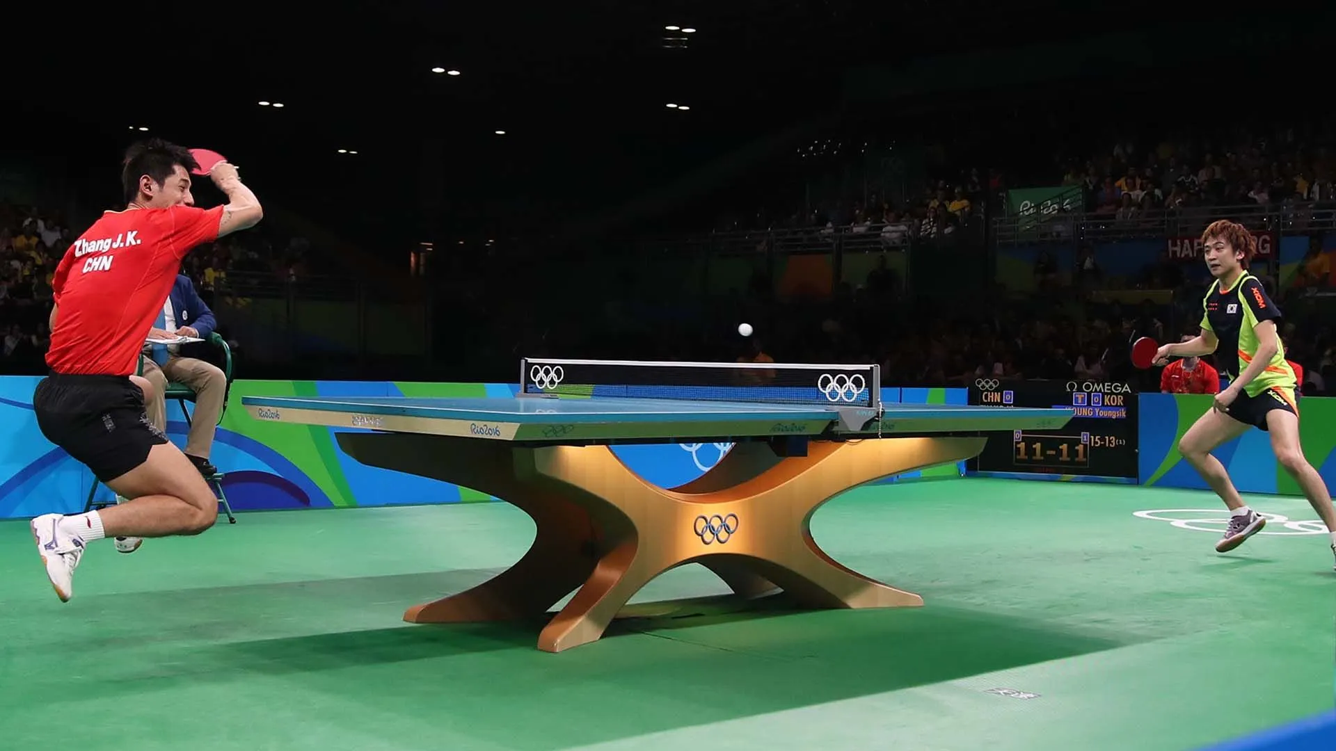 Olympic table. Настольный теннис ОИ. Настольный теннис Олимпийские игры. Олимпийские игры пинг понг. Стол для настольного тенниса Олимпийские игры.