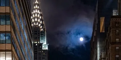 Вид на ночной Нью-Йорк с небоскреба Рокфеллер Плаза