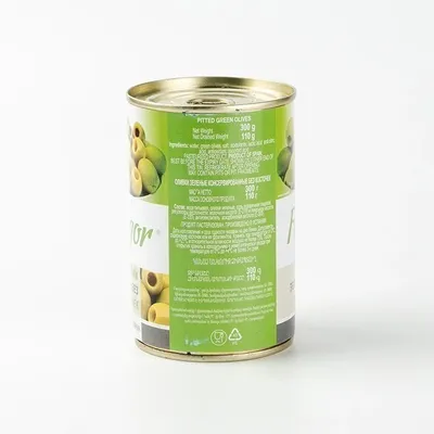 Фотография продукта из банки с оливковыми маринованными огурцами | Премиум  Фото