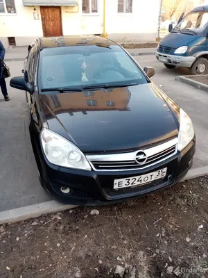 Черный Opel Astra 2012 года с пробегом по цене 870 000 руб. в Новосибирске