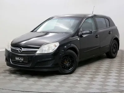 Черный Opel Astra 2012 года с пробегом по цене 870 000 руб. в Новосибирске