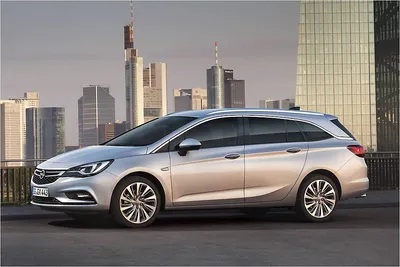 Масштабная модель Opel Astra J Sport Tourer 2010 серый металлик лучшая цена!