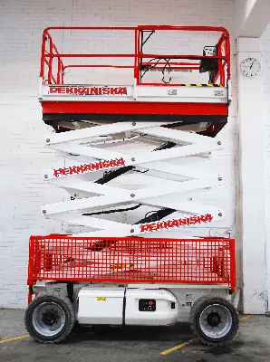 Scissor lift is orange in colour. Rental of specialized construction  equipment Pekkaniska Stock Photo by ©freebrut@gmail.com 535033602