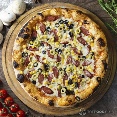 Ганна ТМ, лучшие рецепты - Домашняя пицца с нежной колбасой сырокопченой  полусухой “Королевской”! Пицца - любимое лакомство как детей, так и их  родителей. Ароматное сочетание сырокопченой колбасы, твердого сыра и  тонкого теста