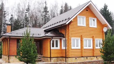 Покраска деревянного дома из бруса снаружи