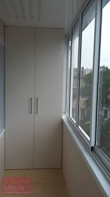 Распашной шкаф на балкон под заказ купить в Киеве из ДСП