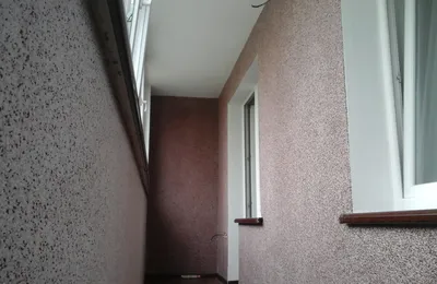 Фото балкона с отделкой штукатуркой