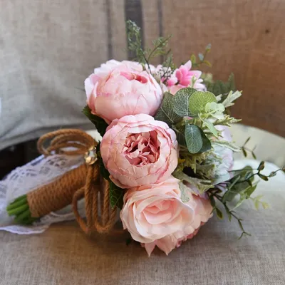 Купить букет невесты из 11 розовых пионов недорого.