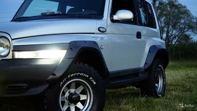 SsangYong Korando (04-10), ТагАЗ Tager (08-) накладка на решетку радиатора  в г.Душанбе