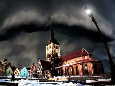 Male Tourist Outdoors In Winter In The Old Town Of Tallinn.Estonia.  Фотография, картинки, изображения и сток-фотография без роялти. Image  158665389