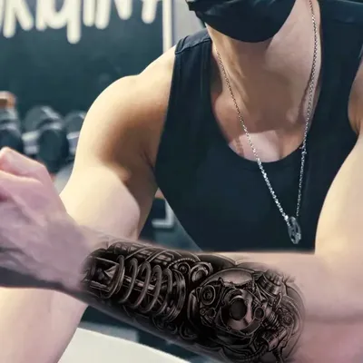 Тату на руке в тату салоне KokinTattoo в СПб