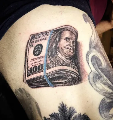 Тату с символом Деньги и его значение в Краснодаре от студии EL'Rash