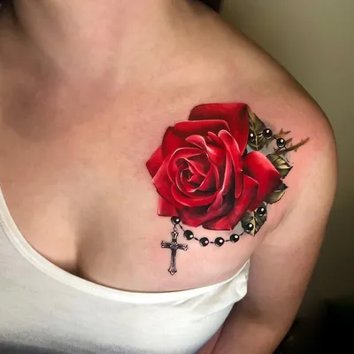Татуировка на спине у девушки - роза — KissMyTattoo.ru