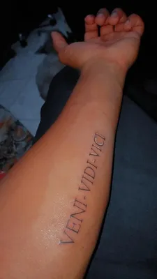 Veni vidi vici\" and olympics ring tattooed on Vincent