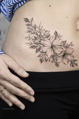 Татуировки на животе женские фото фотографии